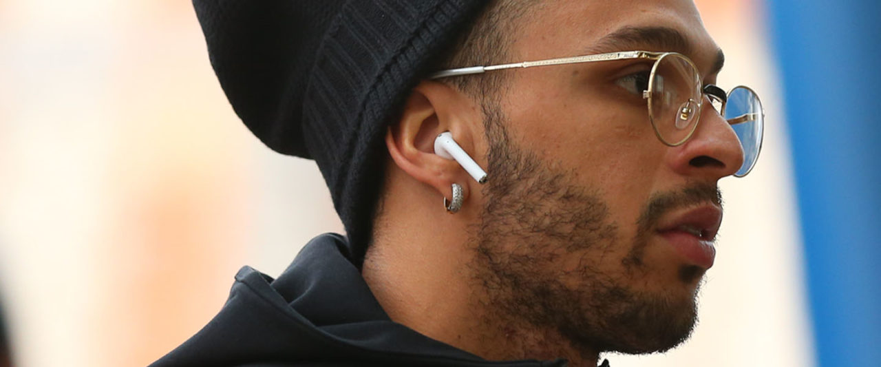 How AirPods Became The Ultimate FakeRichPerson Flex