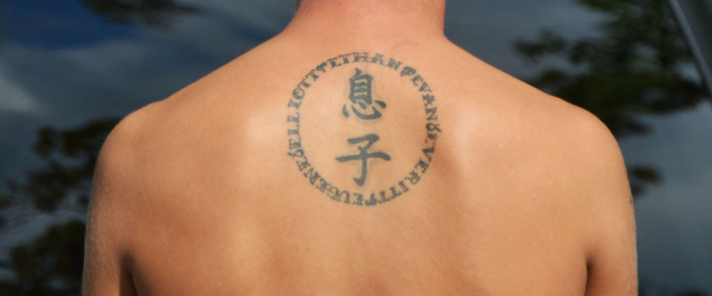 A Tattooed Guy's Guide to Not Fucking Up Your Foreign-Language Tattoo