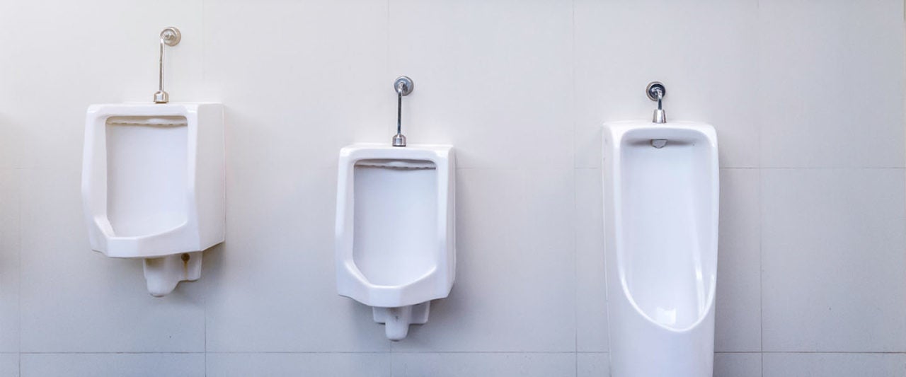 Who Decides How High The Urinals In The Bathroom Are