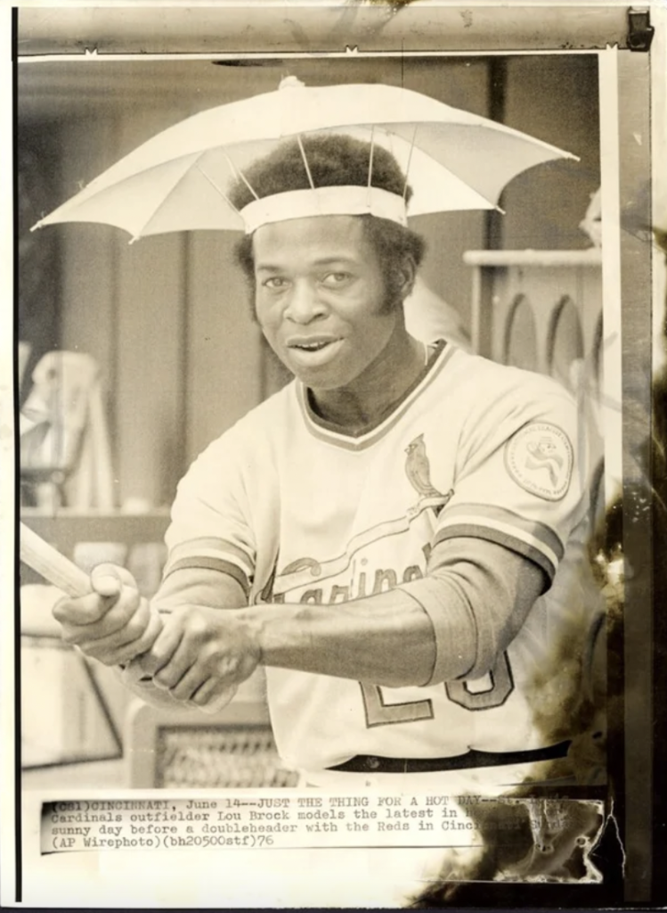 Umbrella hat marked 'Stolen from Lou Brock (World's Greatest Thief)