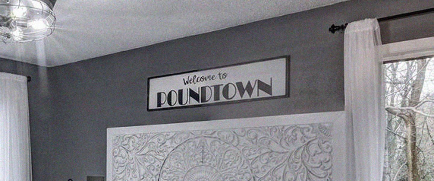 The Wisconsin Mom Who Made the Viral ‘Welcome to POUNDTOWN’ Sign Shares Her Inspiration